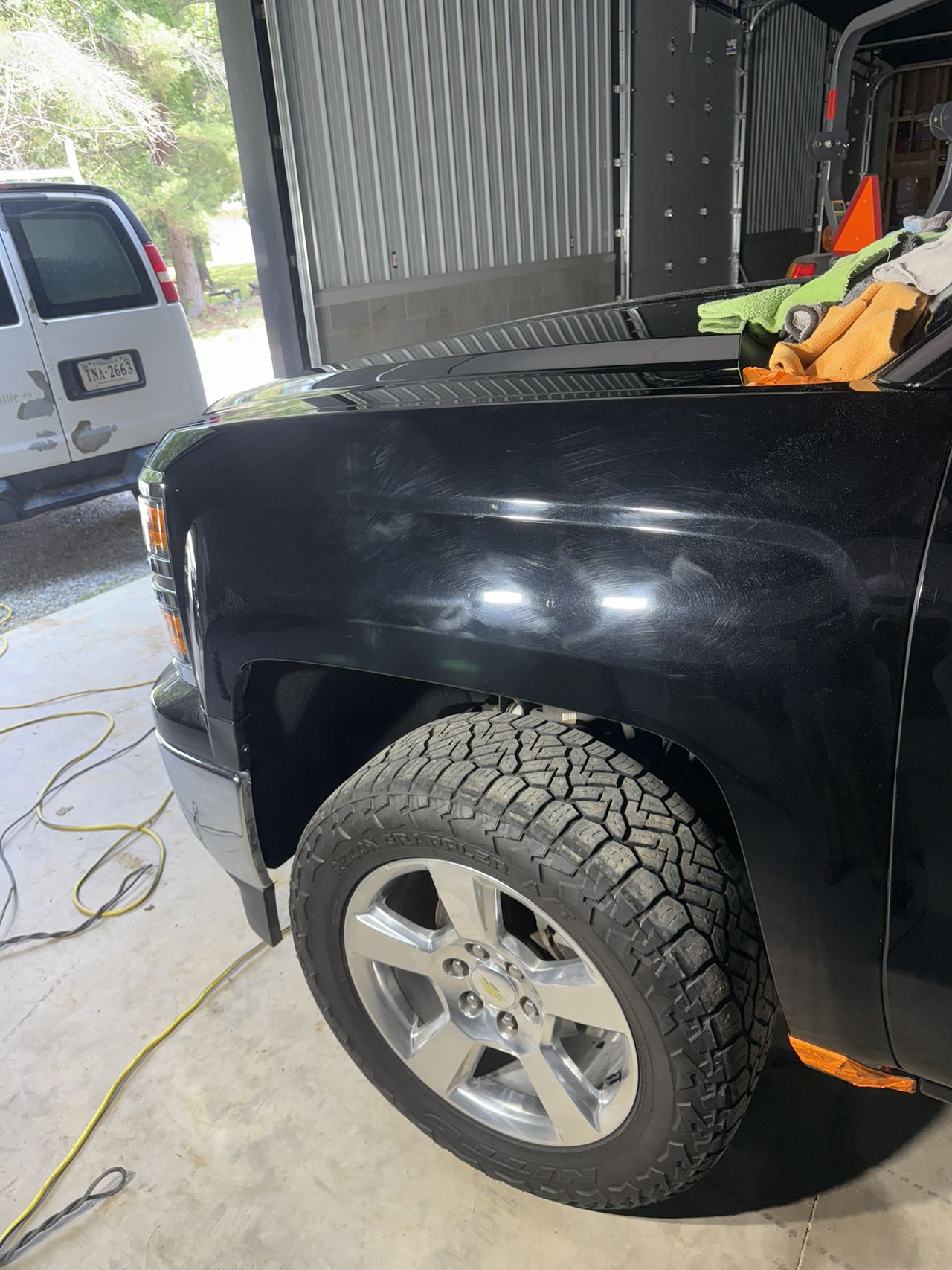 Black truck paint before correction